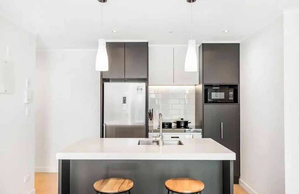 Satin sheen painted walls in an Auckland apartment kitchen